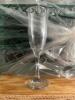 DESCRIPTION (36) CHAMPAGNE FLUTES ADDITIONAL INFORMATION W/ GLASS RACK THIS LOT IS: SOLD BY THE PIECE LOCATION STORAGE CONTAINER QTY 36 - 2