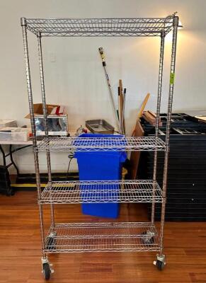 4 TIERED WIRED SHELF ON CASTORS