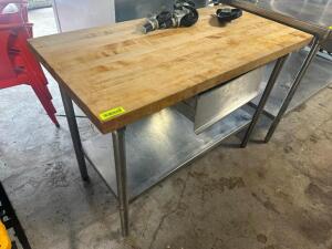 DESCRIPTION 48" X 30" BUTCHER BLOCK TABLE W/ STAINLESS BASE. BRAND / MODEL: JOHN BOOS ADDITIONAL INFORMATION HAS DRAWER. W/ CASTERS SIZE 48" X 30" LOC