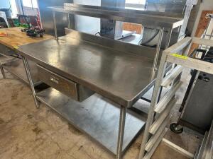 DESCRIPTION 60" X 30" STAINLESS TABLE W/ RISER SHELF. ADDITIONAL INFORMATION HAS DRAWER. SIZE 60" X 30" LOCATION SITE 2 QTY 1