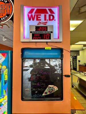 WE ID, SCHLAFLY, AND LIGHT UP SIGN