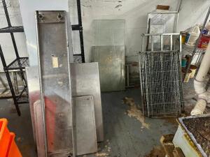 LARGE GROUP OF ASSORTED TABLE TOPS, STAINLESS PIECES, MISC. HARDWARE AND SHELVING PARTS