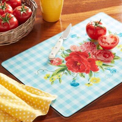 DESCRIPTION: (1) GLASS CUTTING BOARD BRAND/MODEL: THE PIONEER WOMAN/PWS096881814620 INFORMATION: SWEET ROSE/TEMPERED GLASS RETAIL$: $10.97 SIZE: 23.5"