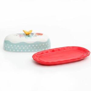 DESCRIPTION: (1) FLEA MARKET BUTTER DISH BRAND/MODEL: THE PIONEER WOMAN/82819.02R INFORMATION: RED WHITE & BLUE RETAIL$: $10.50 SIZE: 10.55"L X 6.85"W