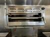 DESCRIPTION WOLF SIX BURNER RANGE W/ SALAMANDER AND LOWER CONVECTION OVEN. BRAND / MODEL: WOLF ADDITIONAL INFORMATION NATURAL GAS. COMES WITH GAS LINE - 4