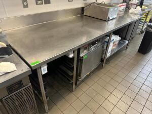 DESCRIPTION 9' X 35" ALL STAINLESS TABLE W/ 6" BACK SPLASH. ADDITIONAL INFORMATION HEAVY DUTY SIZE 9' X 36" LOCATION KITCHEN QTY 1