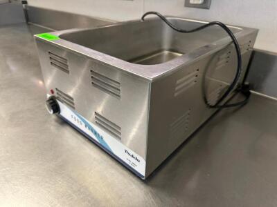 DESCRIPTION SINGLE WELL COUNTER TOP ELECTRIC WARMER. BRAND / MODEL: PADELA ADDITIONAL INFORMATION 115 VOLT, 1 PHASE LOCATION KITCHEN QTY 1