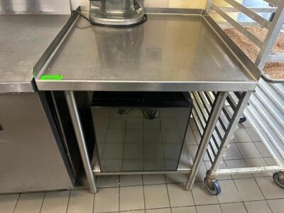 DESCRIPTION 24" X 30" ALL STAINLESS TABLE W/ 1" SIDE AND BACK SPLASH. SIZE 24 "X 30" LOCATION KITCHEN QTY 1