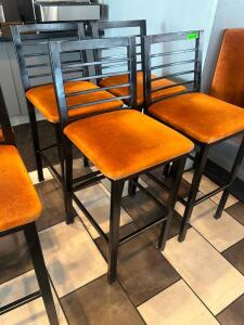 DESCRIPTION (4) 30" LADDER BACK METAL BAR STOOLS W/ ORANGE FABRIC SEATS. THIS LOT IS: SOLD BY THE PIECE LOCATION SEATING QTY 4