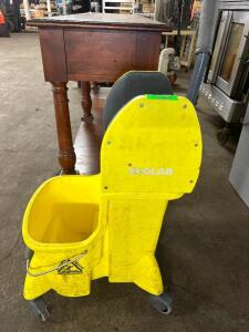 ECOLAB YELLOW PLASTIC MOP BUCKET W/ WRINGER