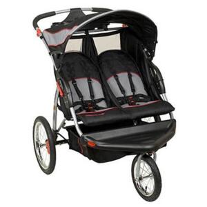 DESCRIPTION: (1) EXPEDITION DOUBLE JOGGING STROLLER BRAND/MODEL: BABY TREND/DJ96773 INFORMATION: GRAY/MAX WEIGHT: 50 LBS/BULIT-IN MP3 SPEAKER RETAIL$: