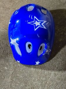 DESCRIPTION: (1) BICYCLING HELMET INFORMATION: BLUE WITH WHITE STARS RETAIL$: $44.00 EA QTY: 1