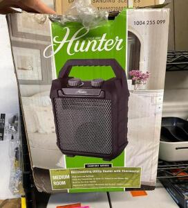 HUNTER 1,500-Watt 5,118 BTUs Fan Heater Electric Recirculating Utility with Adjustable Thermostat