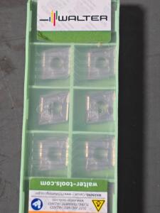 DESCRIPTION: (20) CARBIDE TURNING INSERTS BRAND/MODEL: WALTER CNGG120408-NFT RETAIL$: $426.00 QTY: 20