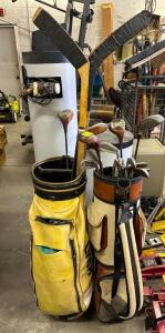 ASSORTED GOLF CLUBS AND HOCKEY STICKS