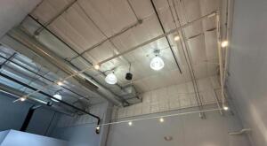 TRACK LIGHTING FIXTURES IN OFFICE AREA