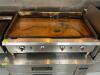 DESCRIPTION SERV-WARE 48" FLAT TOP GRILL. FOUR BURNERS BRAND / MODEL: SERV-WARE ADDITIONAL INFORMATION NATURAL GAS. CHEF BASE NOT INCLUDED SIZE 48" LO