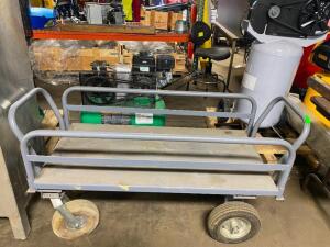 DESCRIPTION: (1) PANEL STAND CART BRAND/MODEL: DURHAM MFG/ INFORMATION: MINOR DAMAGES TO WHEEL, MUST COME INTO INSPECT/GRAY SIZE: 29"H X 52"L X 24-1/2