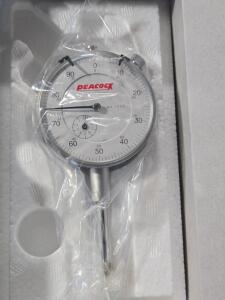 DESCRIPTION: (1) DIAL DROP INDICATOR BRAND/MODEL: PEACOCK 1330 SIZE: 1" MAX 0-100 DIAL READ RETAIL$: $105.63 QTY: 1