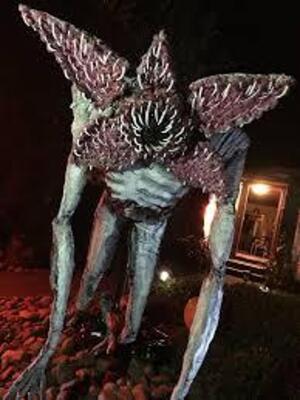 DESCRIPTION: (1) LIFE SIZED NETFLIX CHARACTER LAWN DECOR BRAND/MODEL: STRANGER THINGS INFORMATION: DEMOGORGON SIZE: 7.5' TALL RETAIL$: $479.00 EA QTY: