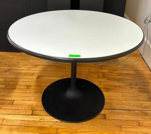 DESCRIPTION: 42" ROUND COMPOSITE DINING TABLE LOCATION: MAIN FLOOR QTY: 1