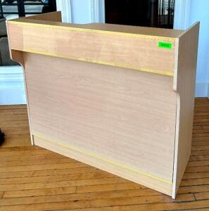 DESCRIPTION: 4' COMPOSITE RECEPTION DESK SIZE: 48"X22"X42" LOCATION: MAIN FLOOR QTY: 1