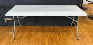 DESCRIPTION: 6' WHITE FOLDING TABLE LOCATION: MAIN FLOOR QTY: 1