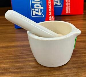 DESCRIPTION: CERAMIC MORTAR AND PESTLE LOCATION: MAIN FLOOR QTY: 1