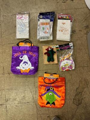 PLASTIC TOTE WITH ASSORTED HALLOWEEN ACCESSORIES AND TOYS