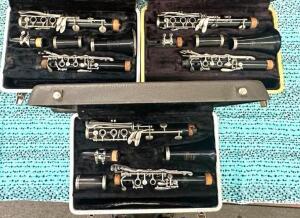 (3)- PLASTIC BUNDY CLARINETS