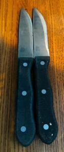 DESCRIPTION (12) STEAK KNIVES W/ BLACK HANDLES THIS LOT IS: SOLD BY THE PIECE LOCATION ROOM 1 QTY 12