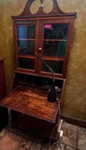 DESCRIPTION 36" WOODEN SECRETARIES DESK WITH GLASS DOOR HUTCH ADDITIONAL INFORMATION APPEARS TO BE MAHOGANY LOCATION ENTRANCE QTY 1