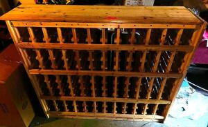 DESCRIPTION WOODEN WINE BOTTLE RACK. LOCATION BASEMENT 2 QTY 1