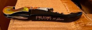 DESCRIPTION (1) CASE OF LORUSSO'S LOGO'ED BOTTLE OPENERS. LOCATION ROOM 3 QTY 1