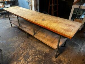 DESCRIPTION: 113" X 27" BUTCHER BLOCK TABLE W/ GALVANIZED BASE. SIZE: 113" X 27" LOCATION: BASEMENT 1 QTY: 1