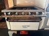 DESCRIPTION: VINTAGE QUICK MEAL STOVE ADDITIONAL INFORMATION: ONE DOOR IS HELD WITH TAPE. ORIGINAL PARTS. SEE PHOTOS. LOCATION: ENTRANCE THIS LOT IS: - 7