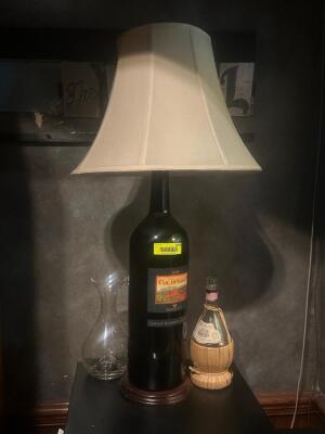 DESCRIPTION: VINTAGE WINE BOTTLE LAMP LOCATION: ENTRANCE THIS LOT IS: ONE MONEY QTY: 1