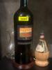 DESCRIPTION: VINTAGE WINE BOTTLE LAMP LOCATION: ENTRANCE THIS LOT IS: ONE MONEY QTY: 1 - 3