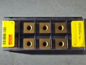 DESCRIPTION: (30) CARBIDE MODULMILL INSERTS BRAND/MODEL: SANDVIK COROMANT 180_009140N1464 S40T RETAIL$: $628.50 QTY: 30