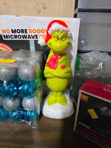DESCRIPTION: (1) OUTDOOR GRINCH DECORATION SIZE: 14" TALL RETAIL$: $14.98 EA QTY: 1