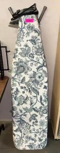 IRONING BOARD WITH CLOTHES IRON