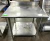 STAINLESS STEEL TABLE WITH BACKSPLASH AND STAINESS UNDERSHELF