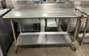 STAINLESS STEEL TABLE WITH BACKSPLASH AND STAINLESS UNDERSHELF WITH CAN OPENER ON CASTERS