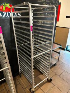 DESCRIPTION TWENTY PAN ROLL ABOUT TRAY RACK. LOCATION FRONT QTY 1