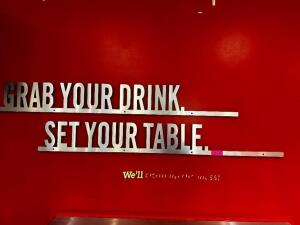 DESCRIPTION "GRAB YOUR DRINK SET YOUR TABLE" WALL SIGN ADDITIONAL INFORMATION W/ ASSORTED FAZOLIS SIGNS LOCATION FRONT QTY 1