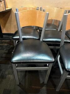 DESCRIPTION (8) METAL FRAME CHAIRS W/ WOODEN BACK AND PADDED SEAT CUSHIONS. ADDITIONAL INFORMATION CUSHIONS ALL HAVE NORMAL WEAR AND TEAR. THIS LOT IT