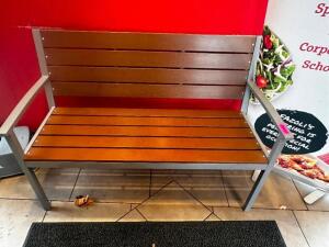 DESCRIPTION 48" METAL FRAMED BENCH SEAT W/ WOODEN SEAT AND BACK. LOCATION FRONT QTY 1