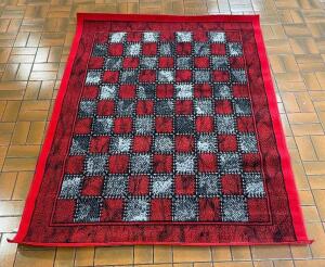 74" RED AND BLACK CHECKERED AREA RUG