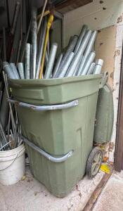 TRASH CAN OF ASSORTED LENGTH METAL PIPING