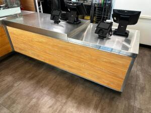 DESCRIPTION (3) PIECE STAINLESS SALES COUNTER. (2) 59" SECTIONS AND (1) 37" SECTION. BRAND / MODEL: RANDELL W633441-1 ADDITIONAL INFORMATION GLASS SNE